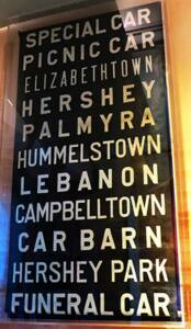 White lettering on black flexible sign roll