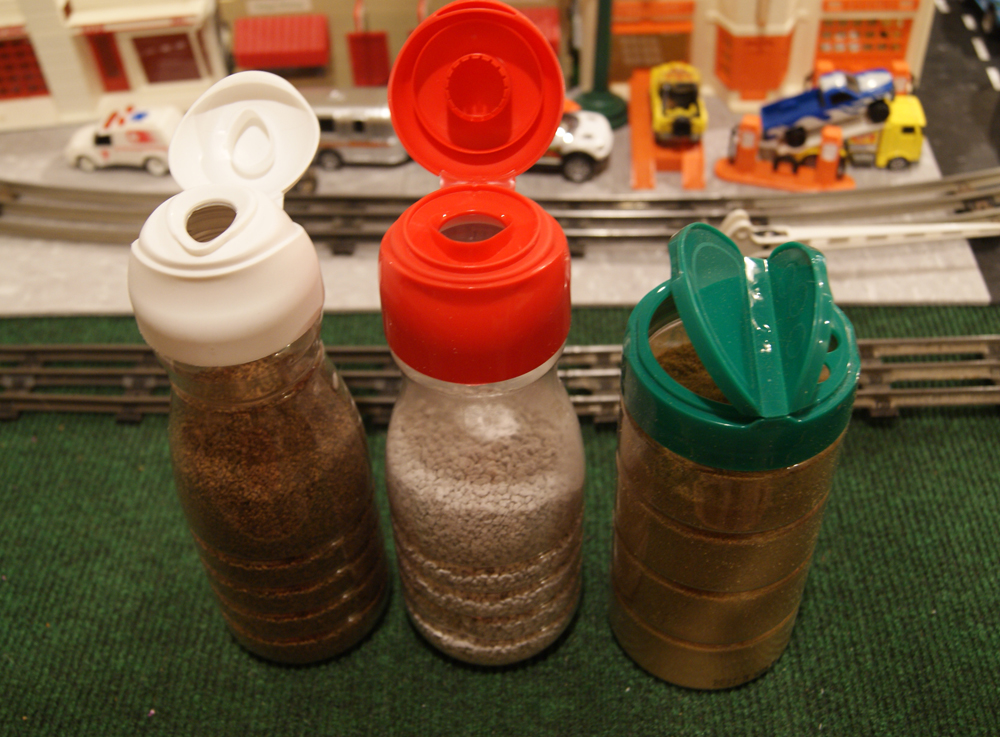 three containers on a tabletop