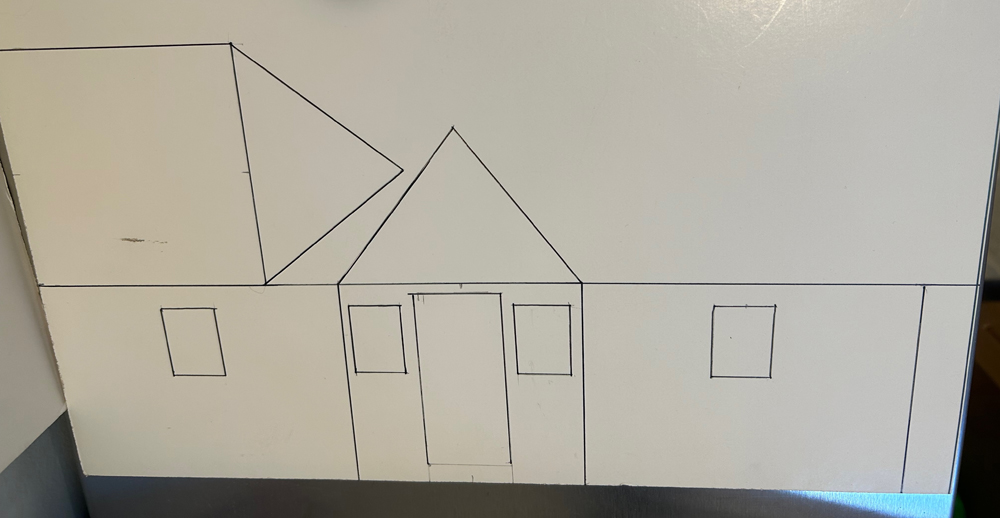 piece of foam board with shapes drawn on it
