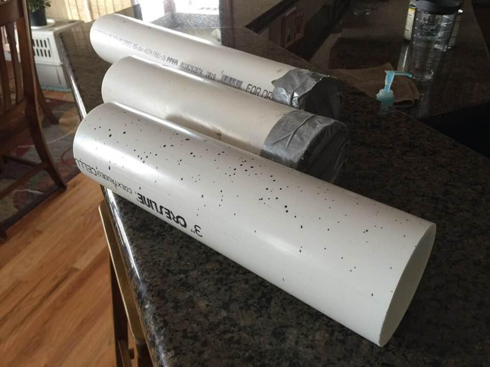 pieces of white PCV pipe on a counter