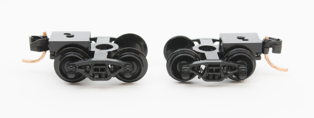 Color photo showing plastic wheelsets in N scale freight car trucks.