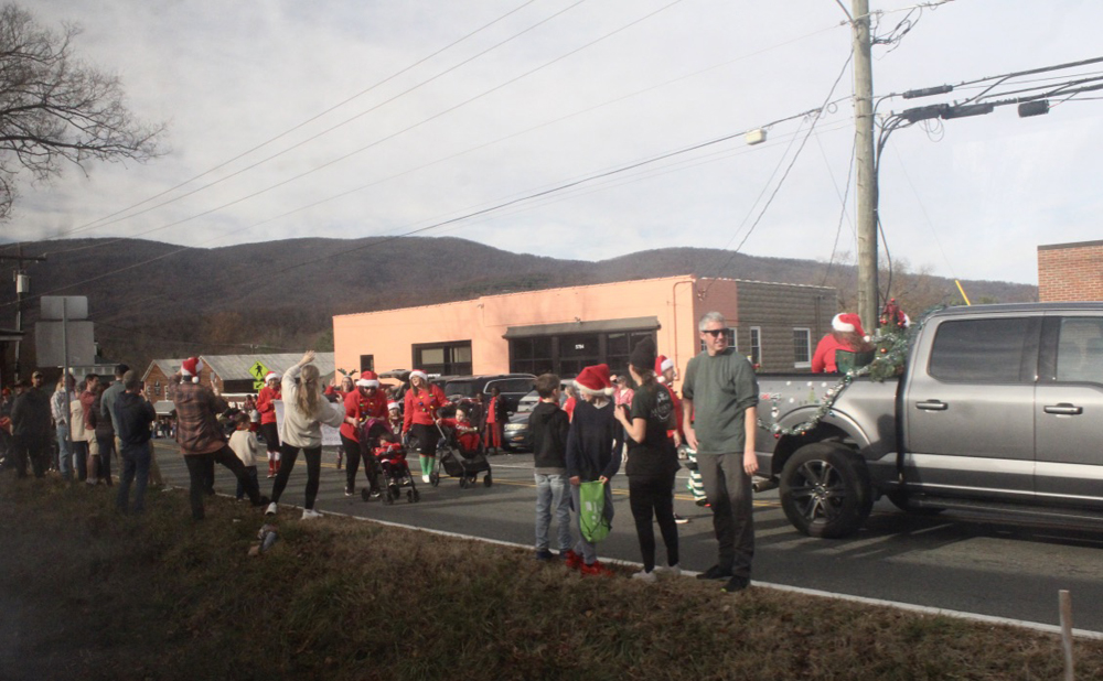 People with strollers in parade