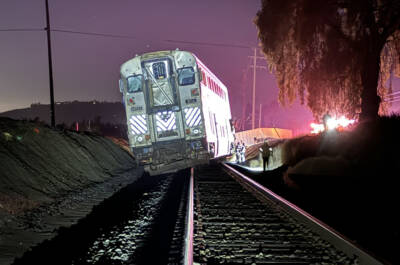 Five hospitalized after Pacific Surfliner hits truck, derailing one car