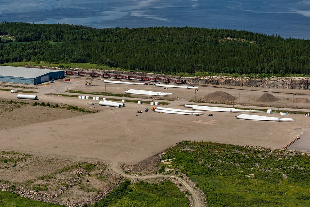Small rail yard and storage area with wind machine parts
