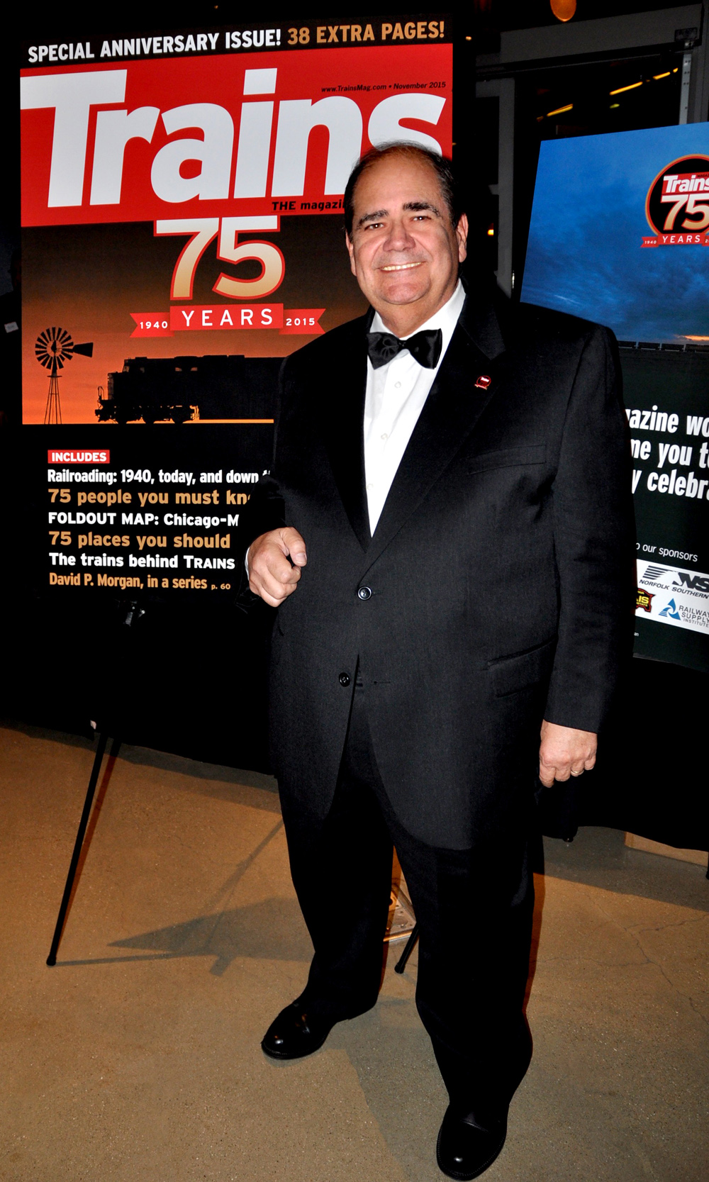 man in black suit with bowtie
