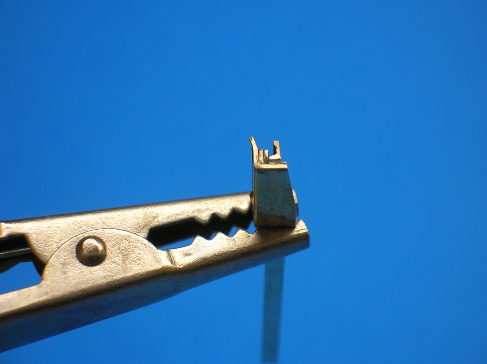 A cutaway view of a lift-frog closure rail