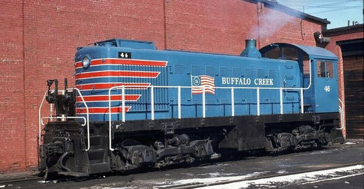 Light blue end-cab switcher with red and white trip