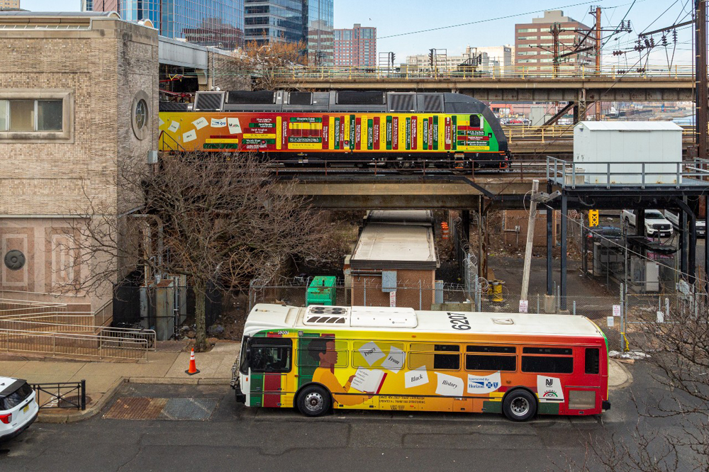 Multicolored locomotive and bus