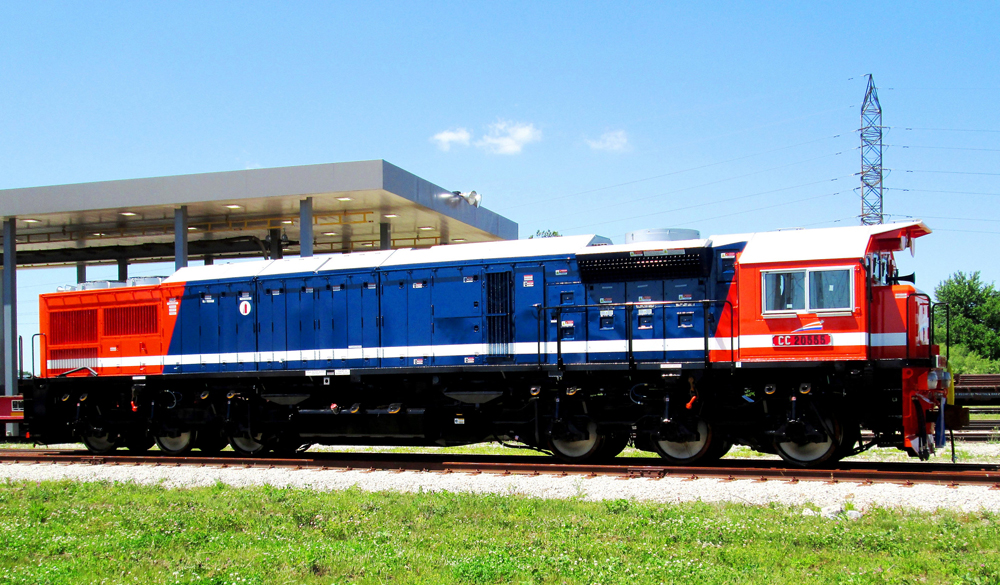 Red and blue six-axle locomotive