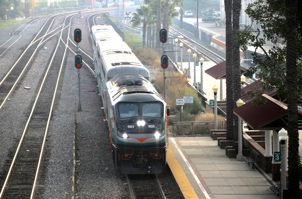 Overhead view of commuter train at station