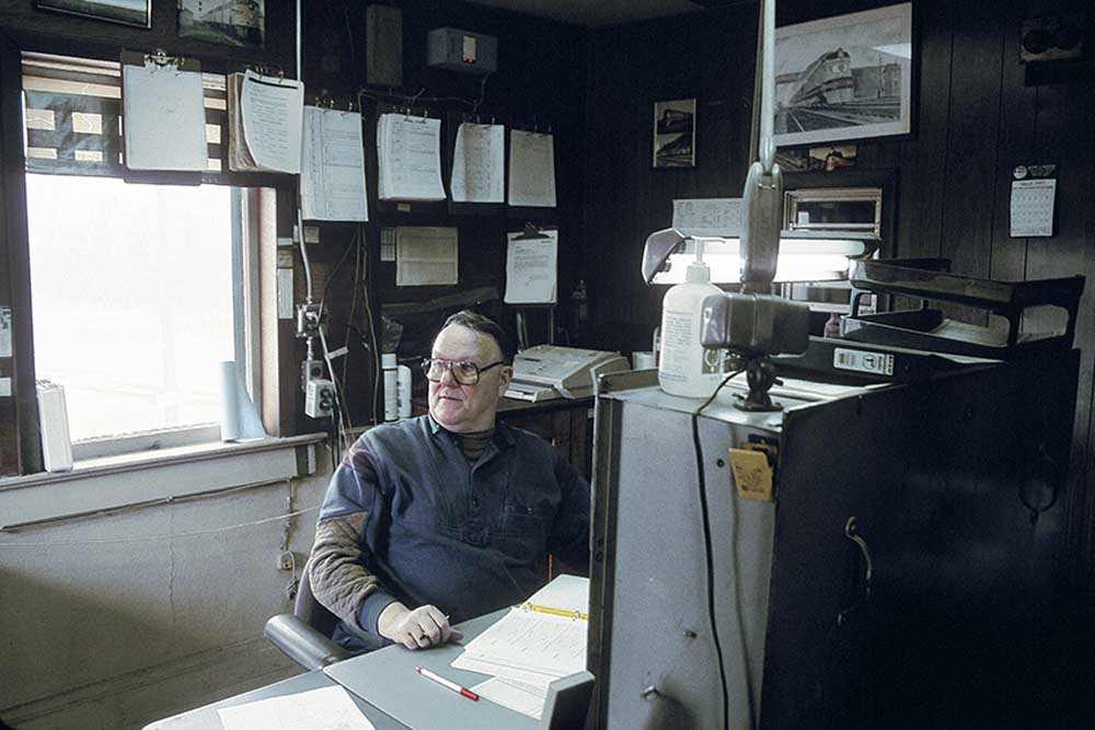 Man with glasses at desk