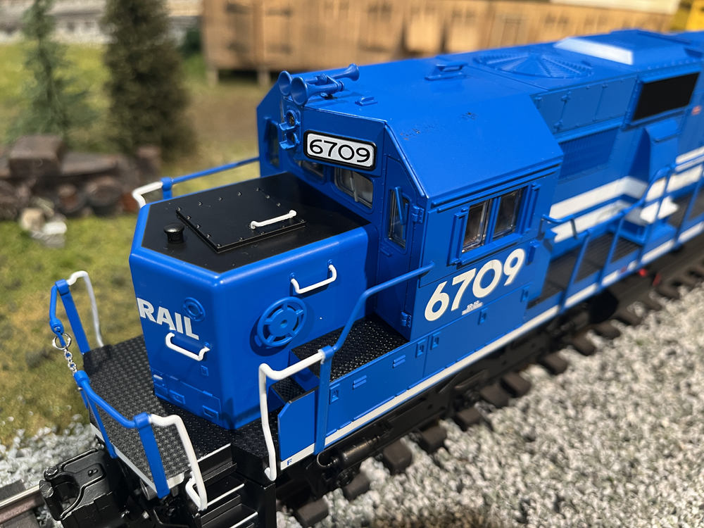 close up of blue model engine