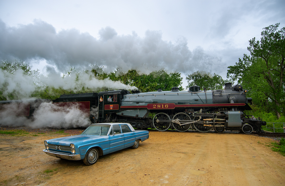 Steam locomotive with 1960s autombole