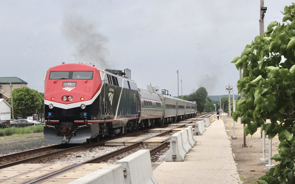 Passenger train leaving station
