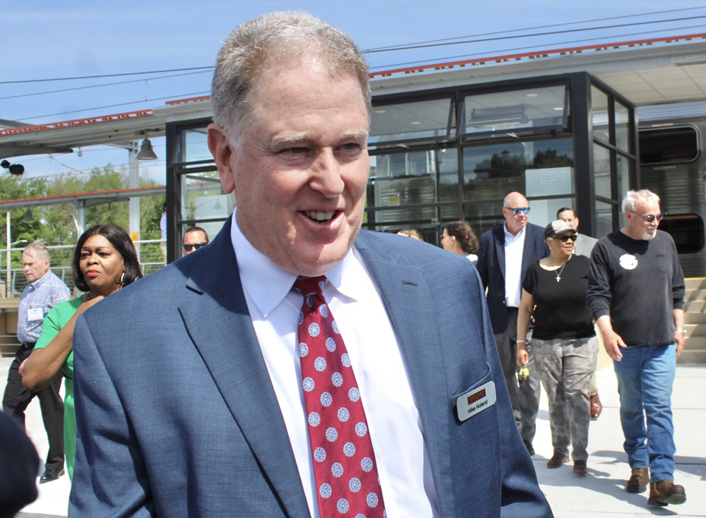 Man in blue suit and red tie