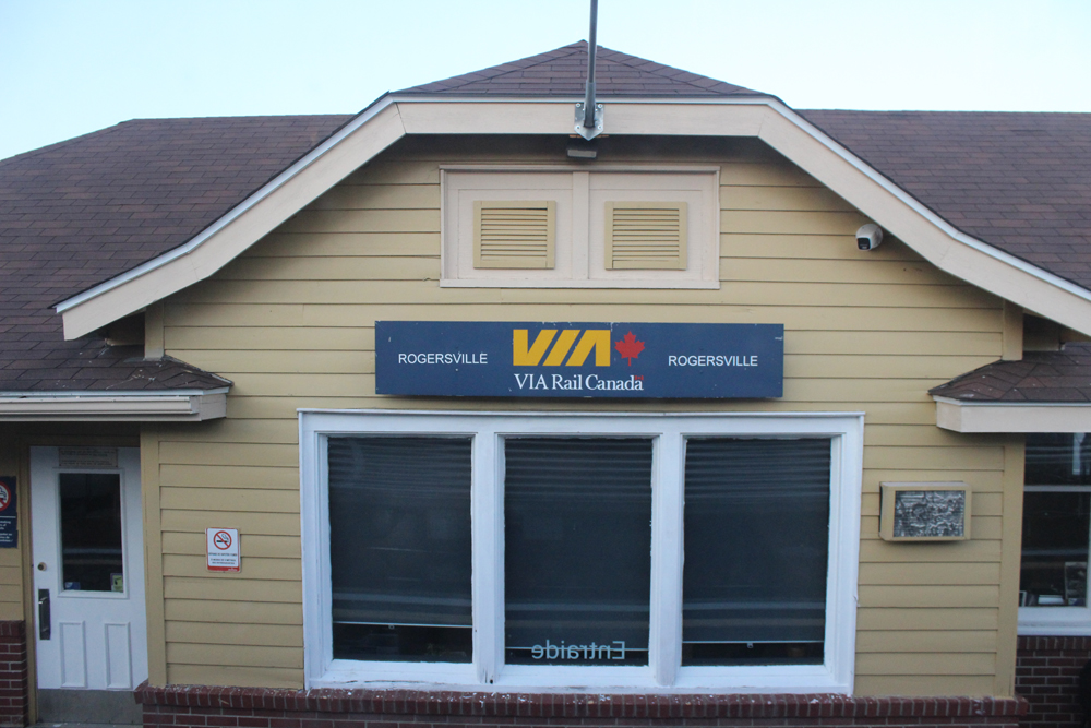 Yellow wooden train station building