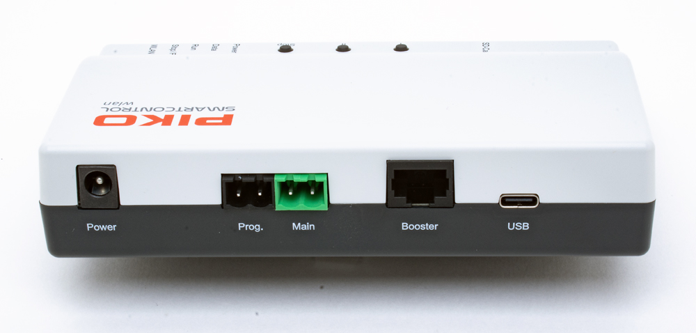 Photo showing rear of two-tone gray plastic electronics box. 