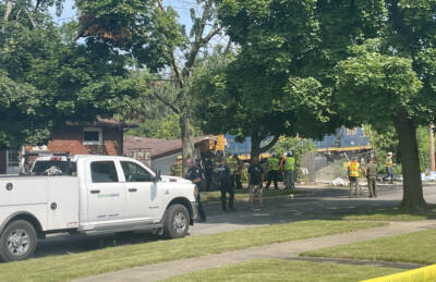 Locomotive derails, destroys garage — for the second time