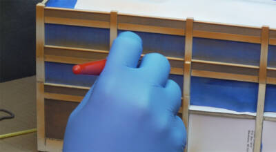 What causes a rough finish on an airbrushed structure?