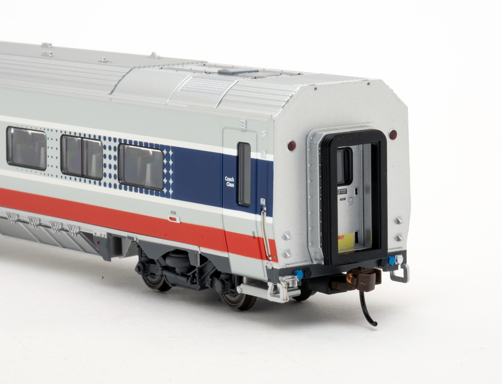 Color photo showing end details on HO scale passenger car.