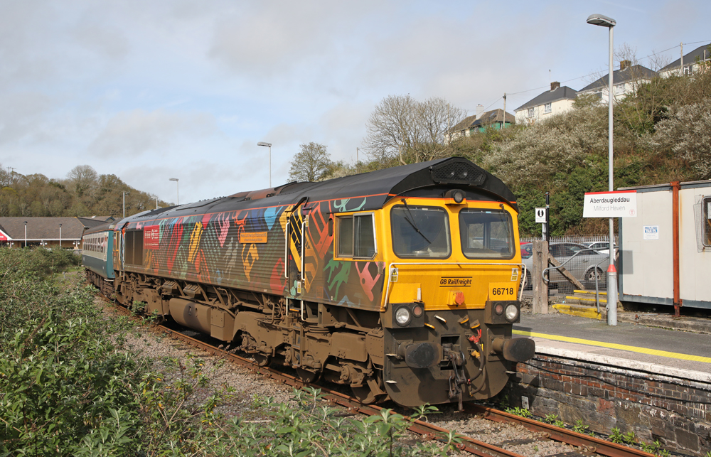 Multi-colored boxcab-style British diesel locomotive 