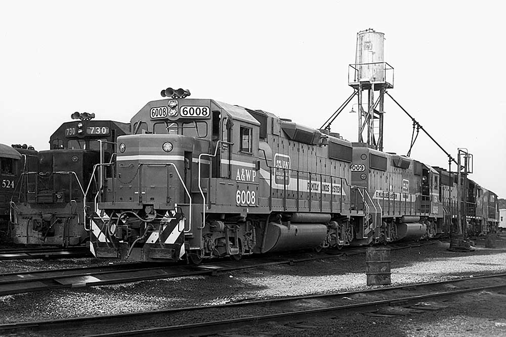 Diesel Atlanta & West Point locomotives under sanding tower