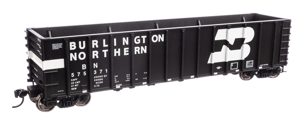 A black model freight car with white lettering