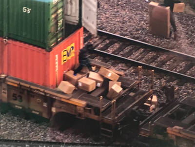 Two charged in looting of UP freight train
