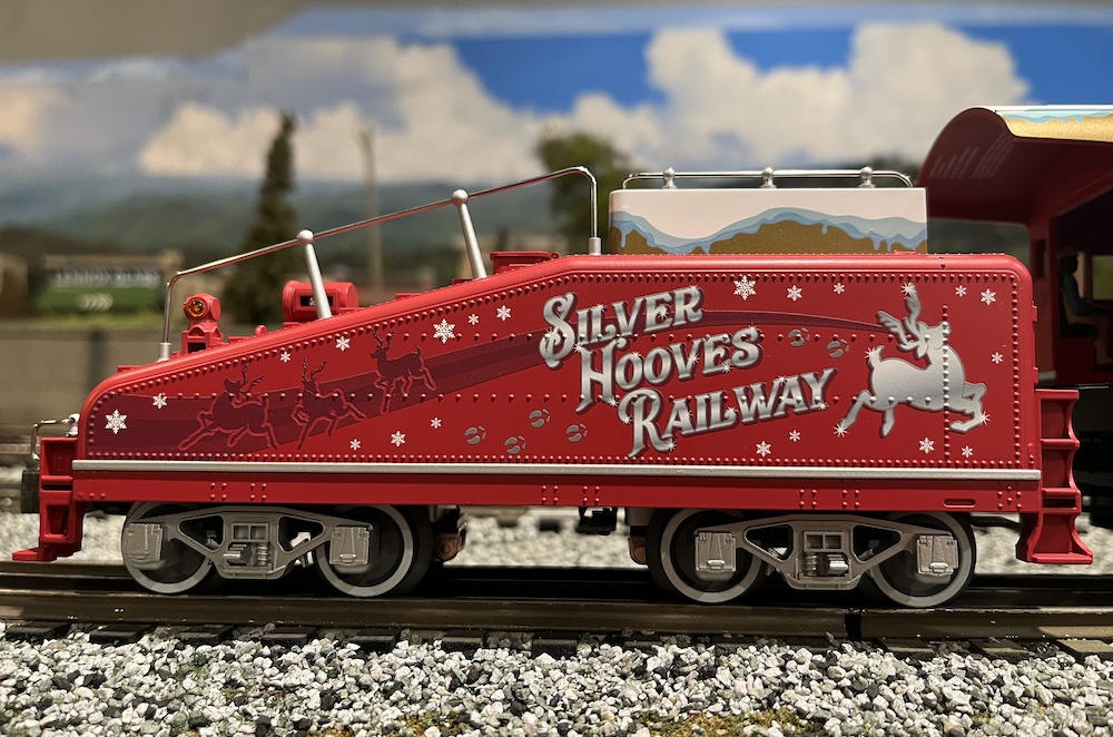 model of tender with Christmas graphics