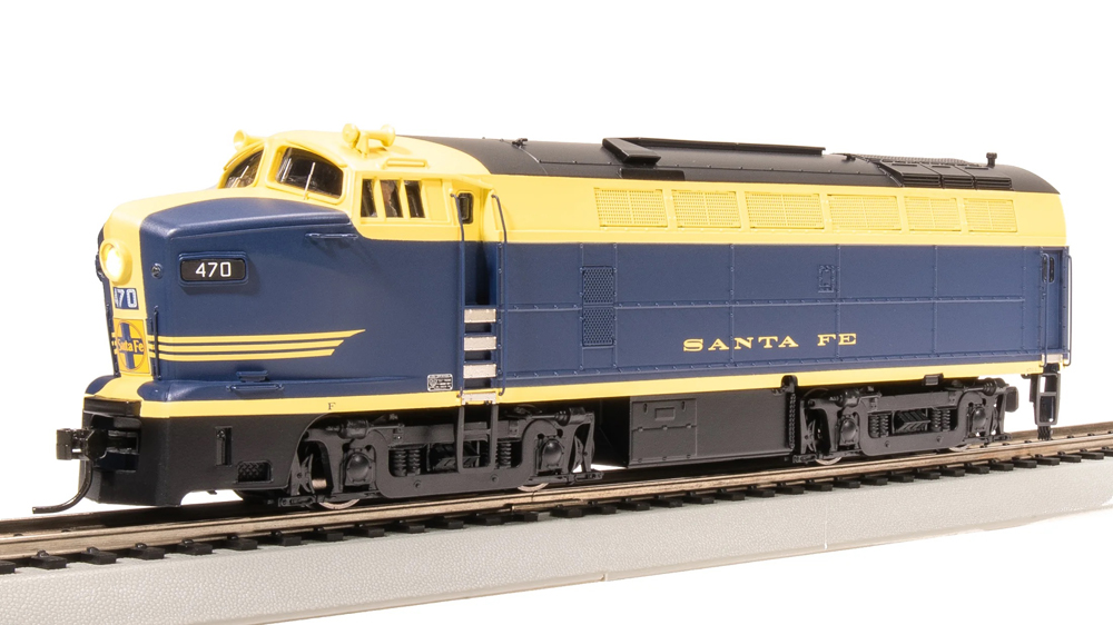 A yellow and navy blue model locomotive