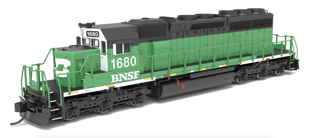 A black and green model freight car
