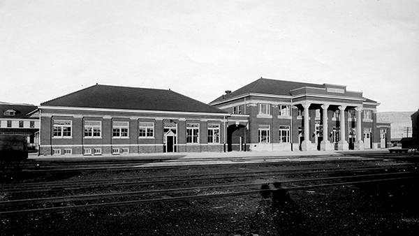 Black and white photo of large passenger station