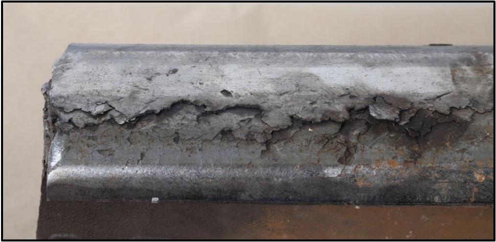 Close up of rail with cracking on surface
