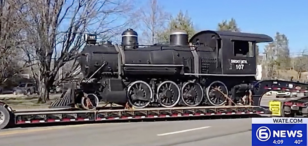 Steam locomotive on truck trailer