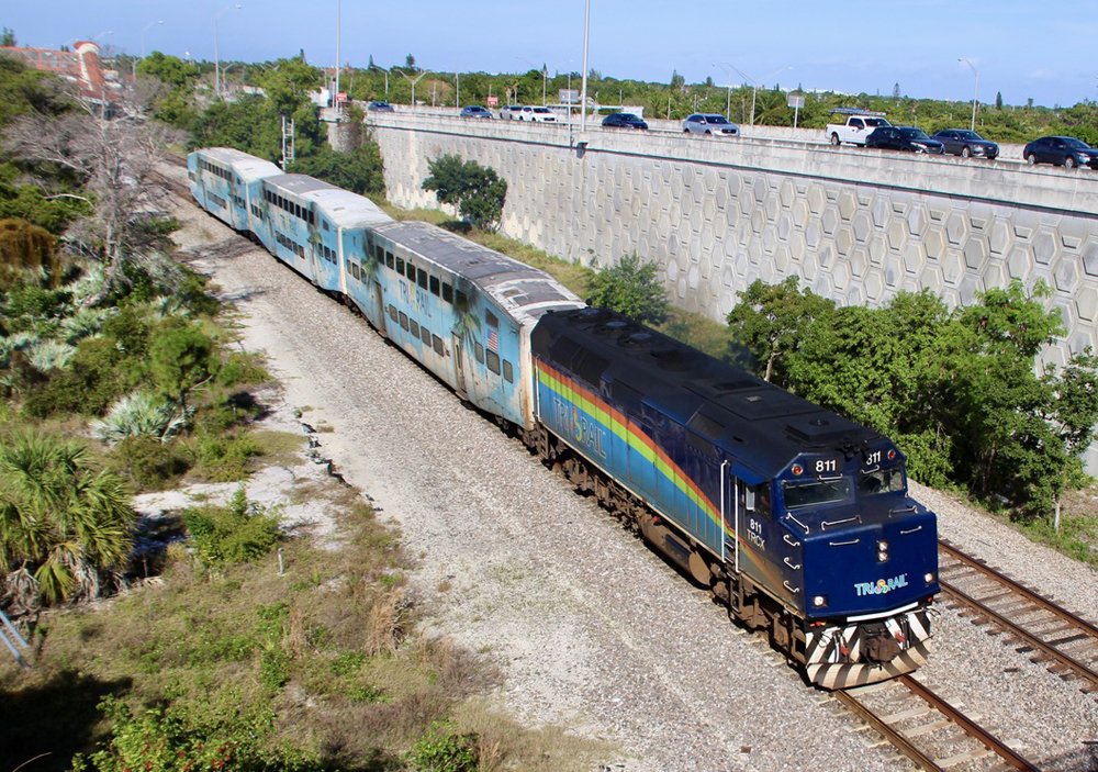 View of commuter train from overpass