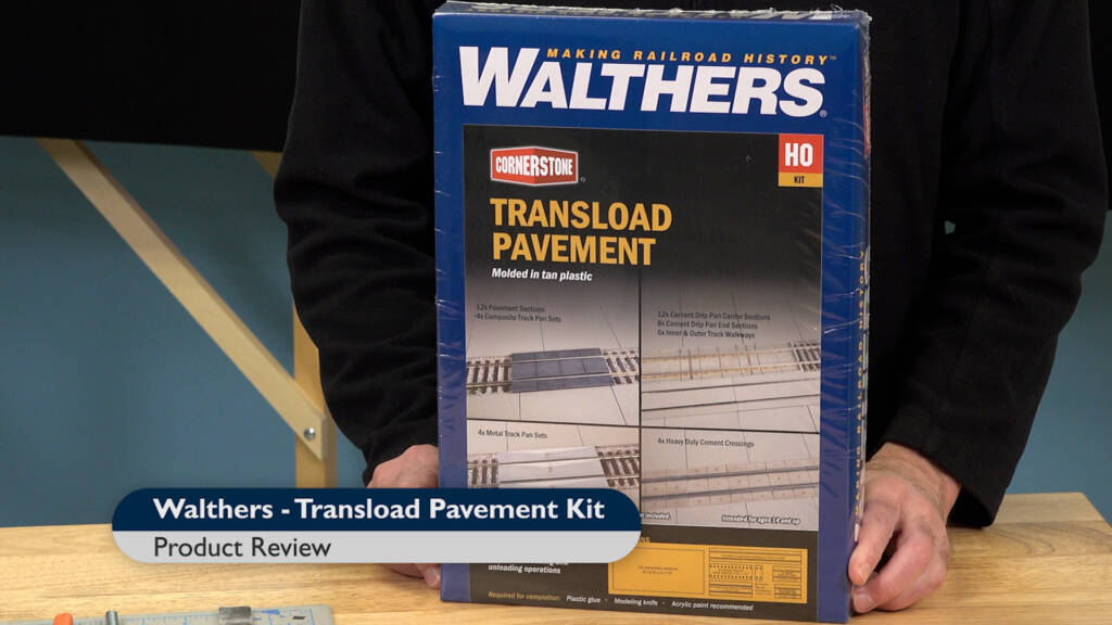 Screen capture of product box on workbench with title bar in lower left corner.