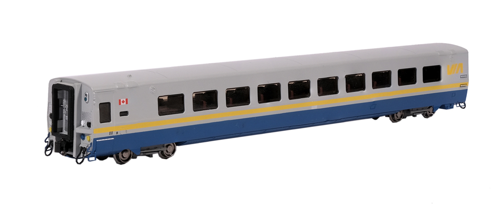 A gray, yellow and blue model passenger coach