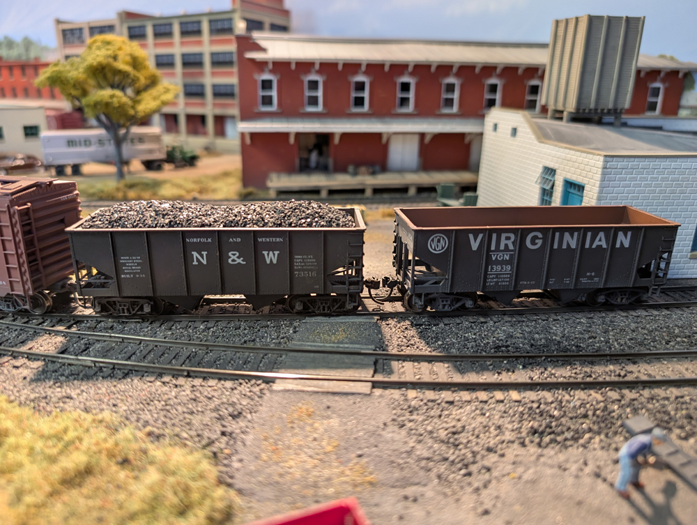 Two HO scale coal hoppers