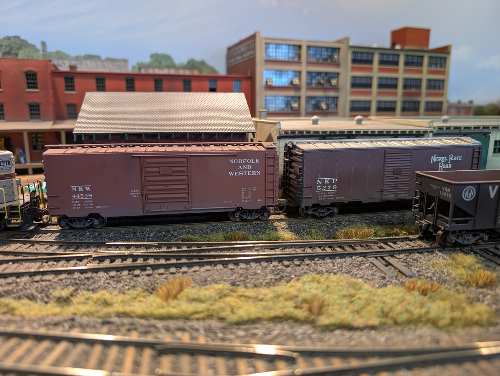 HO scale boxcars at a loading dock