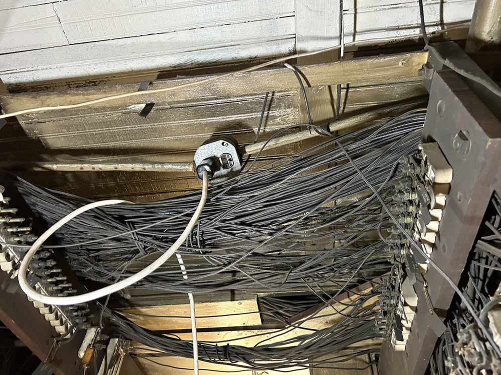 Mass of wires on ceiling of room