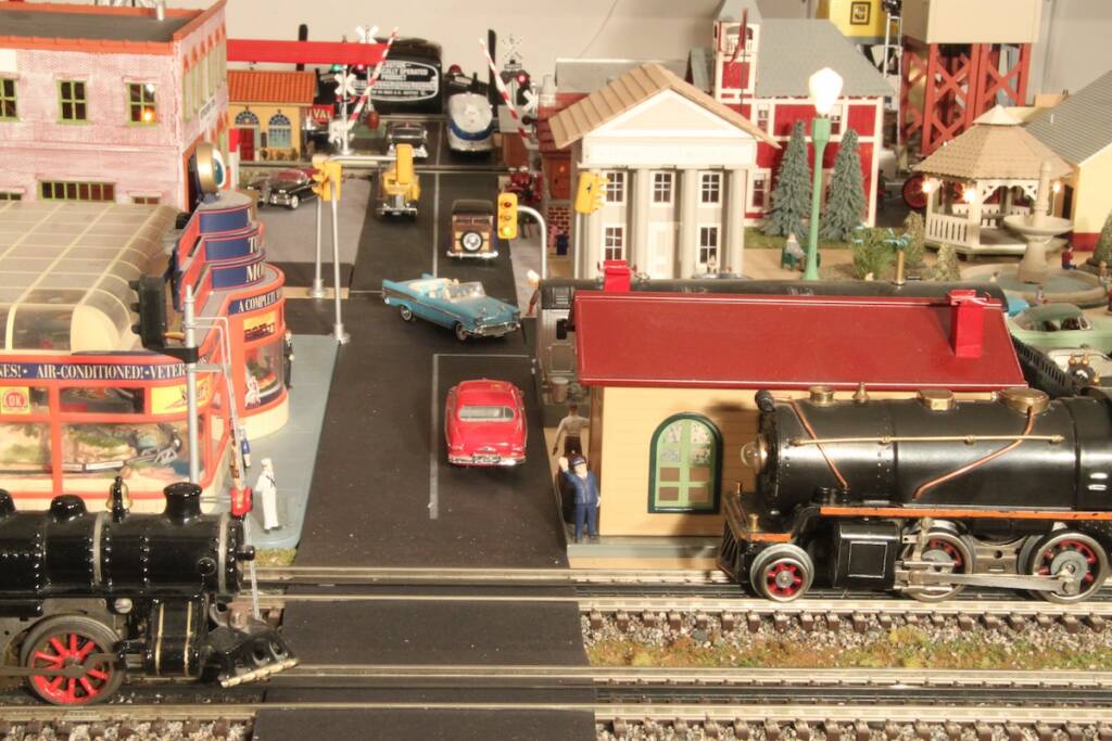 scene on toy train layout with hobby shop