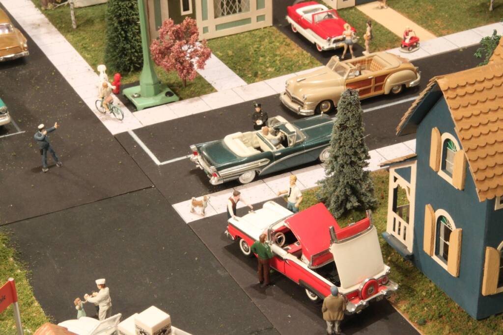 neighborhood scene on toy train layout