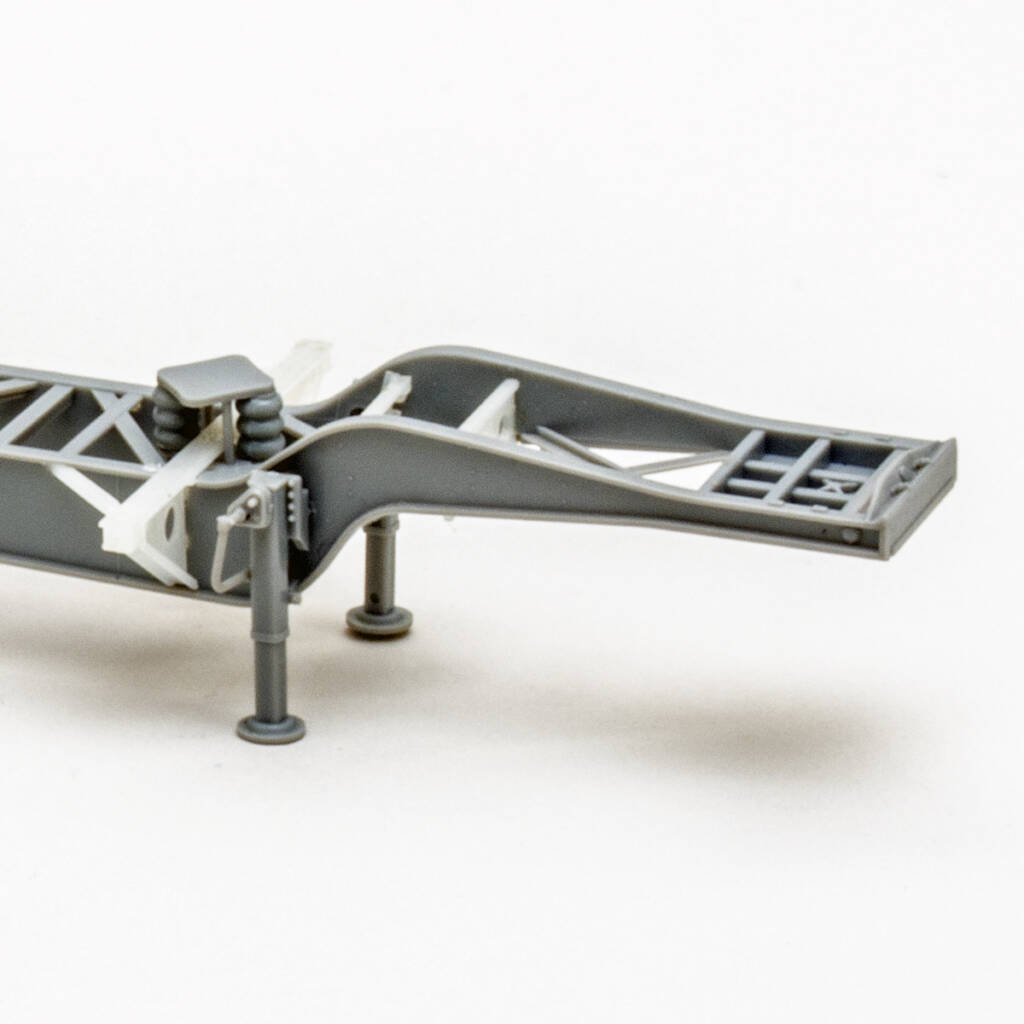 Color photo of undecorated HO scale trailer on white background