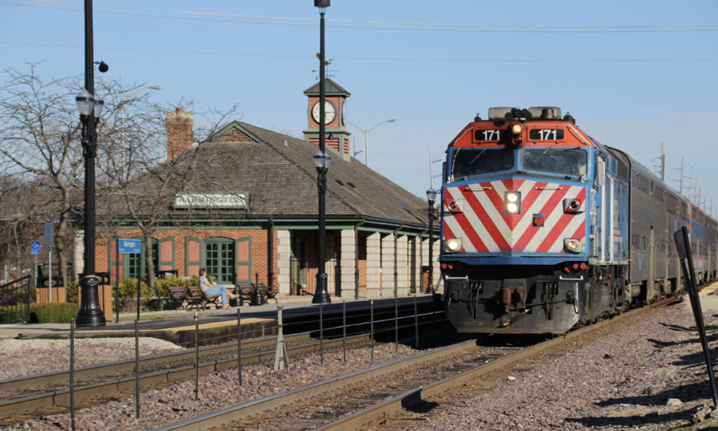Commuter train arrives at station