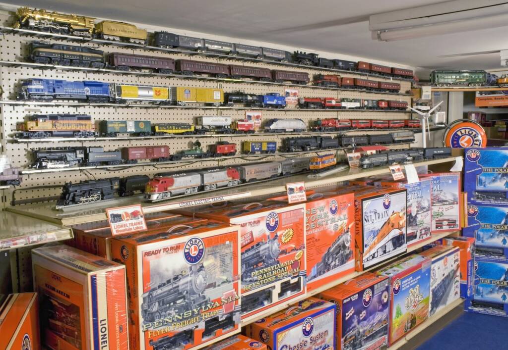 view of a hobby store with shelves of products