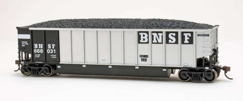 Color photo of HO scale bathtub coal gondola painted silver and black