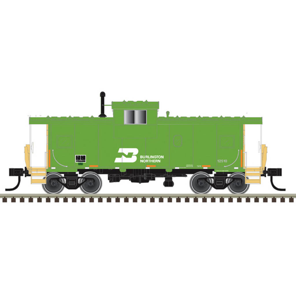 A green and yellow model locomotive