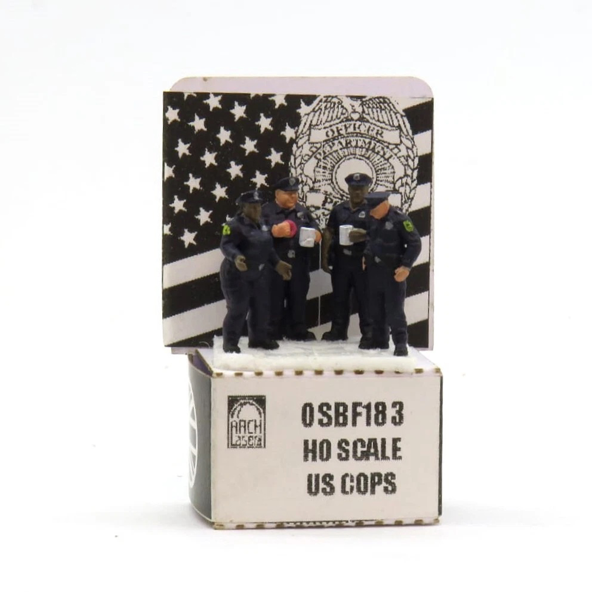 A set of four police figures for model railroad layouts
