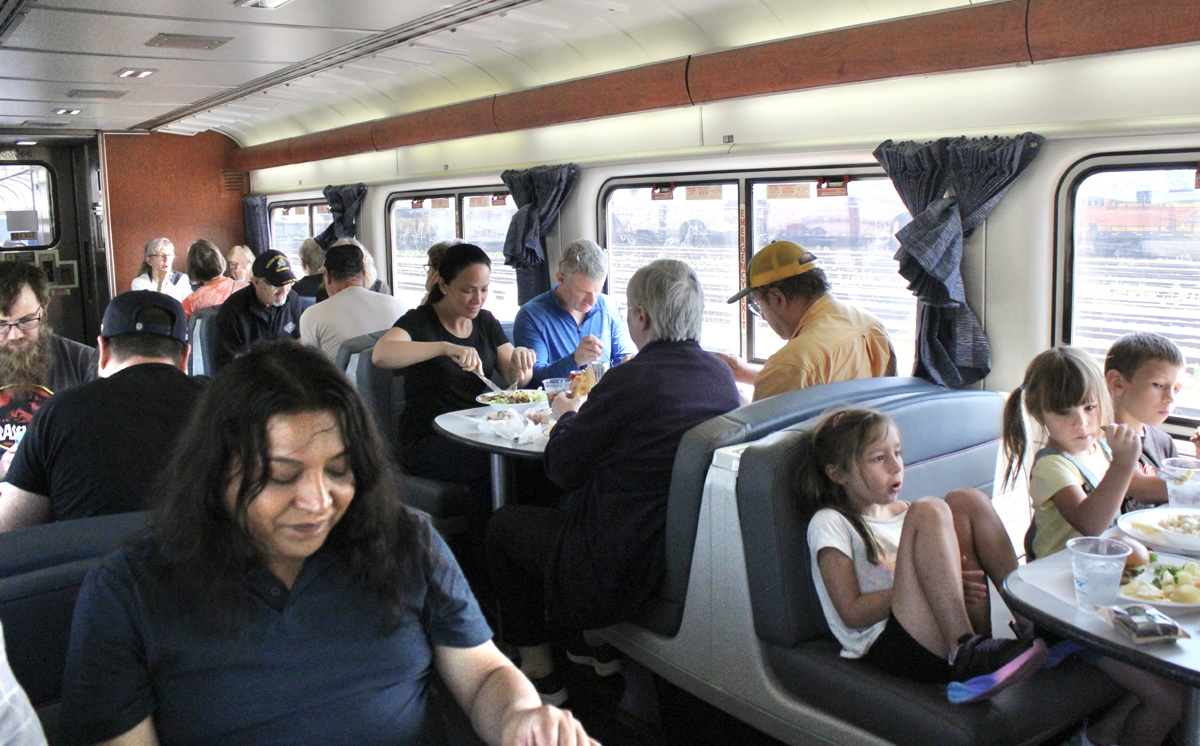 People eating in dining car
