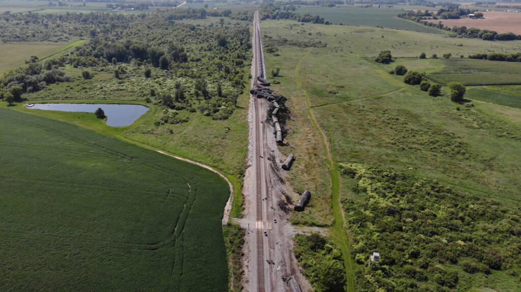 Aerial view of derailed freight train